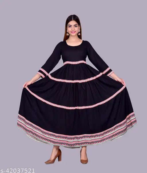 Women's black rayon kurti with three-quarter sleeves, solid design. Size S (Bust 36in, Length 48in), perfect for a classy, comfortable look. Made in India