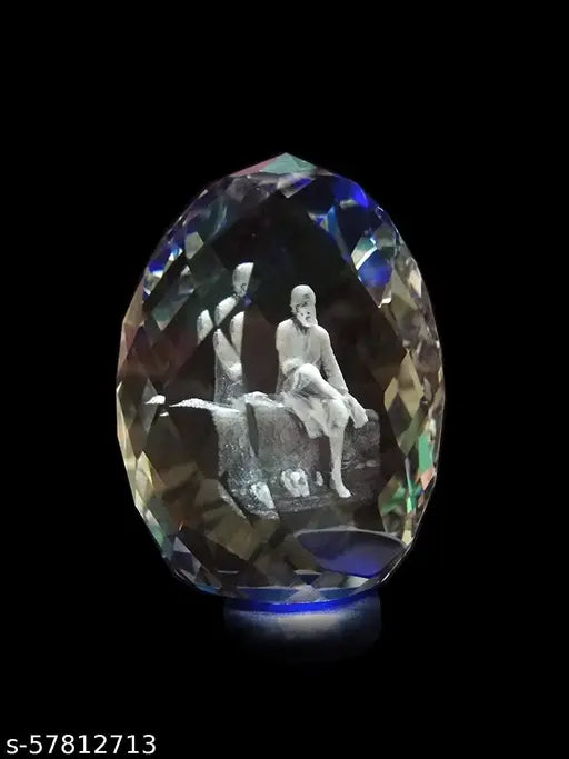 Blue Crystal Shirdi Sai Baba Idol, handcrafted by Shinde Exports, perfect for decorative purposes or gifting, measures approximately 2 inches in height and weighs around 95gms