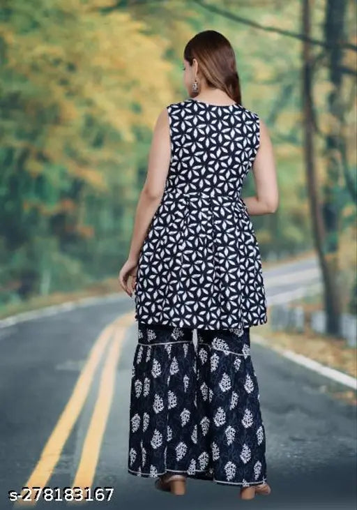 Black rayon kurta and sharara set with printed net pattern, sleeveless, on model
