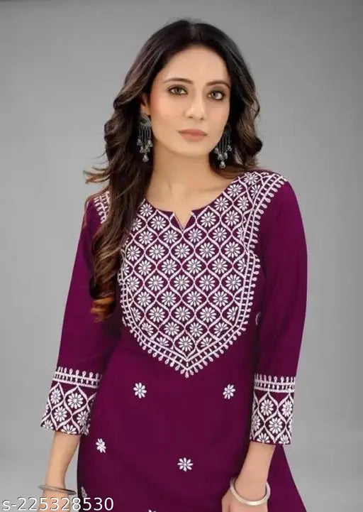Purple rayon embroidered kurti with three-quarter sleeves. India-origin traditional Rayon clothing for women's functions and festivals, comfortable and elegant