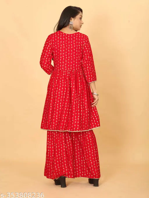 Cotton printed Sharara & Flared Kurta set, premium rayon fabric, three-quarter sleeves, Indian fashion ensemble on display