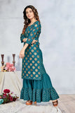 Gold foil-printed rayon straight kurta with sharara bottom, perfect fit for casual or party wear, women's fashion accessory on display