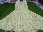 Green rayon anarkali gown with zari embroidery, perfect for Indian weddings and special events