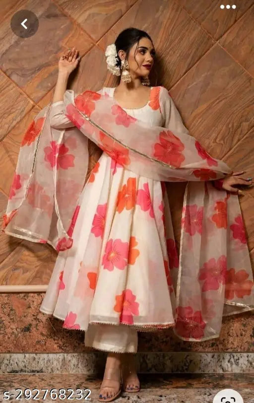 Floral printed Georgette kurta set with cotton blend pants and dupatta, three-quarter sleeves, round neck. Perfect for all seasons, various sizes available. Made in India