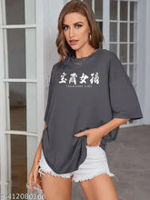 Trendy oversize cotton blend t-shirt in loose fit, three-quarter sleeves with printed net design. Perfect casual wear, origin India