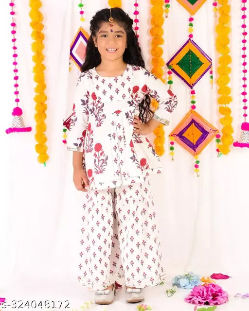 White floral cotton kurti-sharara set with gota detailing, three-quarter sleeves. Traditional ethnic little girl's outfit in soothing white and eye-catching floral print. Indian made, available in sizes from 6-12 months to 8-9 years
