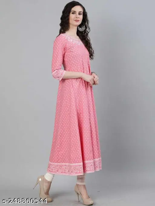 Rayon printed kurti with three-quarter sleeves, vibrant Indian fashion on mannequin