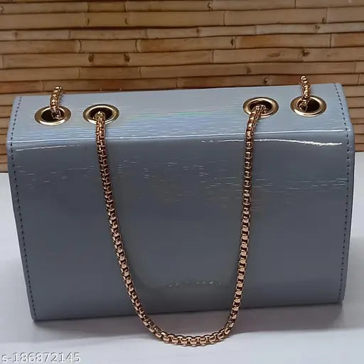 Synthetic sling bag for women and girls with self-design net pattern. Free size (9in x 6in x 3in), originating from India