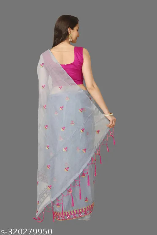 Mustard yellow Super Net saree with mirror work and separate dupion silk blouse, showcasing intricate multi-thread embroidery work