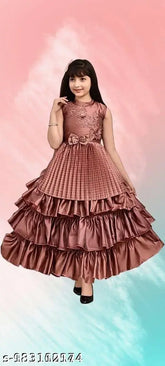 Pink solid embroidered silk blend party dress, high quality for girls aged 3-12. Checked net pattern, long sleeves. Ideal for birthdays or celebrations