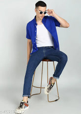 Dark blue cotton blend jacquard jeans for men, flat finish - skinny fit, cropped length, subtle texture, trendy style. Size: 28, 30, 32 (waist 28/30/32, length 40 in, hip 35/37/39 in). Made in India