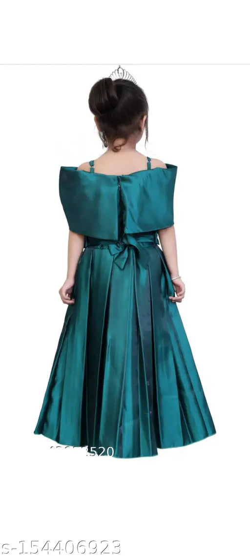 Green cotton blend ethnic long frock dress for girls with three-quarter sleeves, perfect for parties or special occasions. Made in India