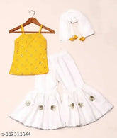Soft silk lehenga choli set with net dupatta, embellished work for toddlers, Indian partywear fashion on display