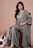 Grey Rayon Rashi Women's Kurta with Sharara and Dupatta set, featuring A-line style, three-quarter sleeves, and stitched net detailing. Elevate your ethnic wardrobe with this versatile and stylish piece for various occasions. Hand wash only