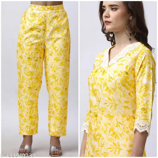 White Rayon Kurta Pant Set with Embroidered Lace, featuring V-neck and three-quarter sleeves. Comfortable Palazzo pants made from breathable Rayon fabric