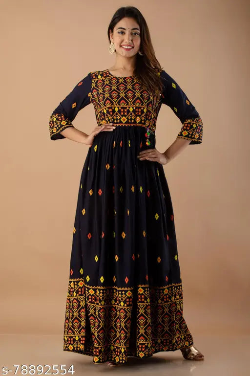 Black rayon printed Anarkali Kurta/Gown with three-quarter sleeves, flared silhouette for women (XL) - Indian traditional wear on mannequin