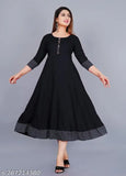Stylish black rayon round pleated flared kurti with three-quarter sleeves, suitable for casual and formal occasions. Size range: XS-XXXL. Hand wash or machine wash; made in India