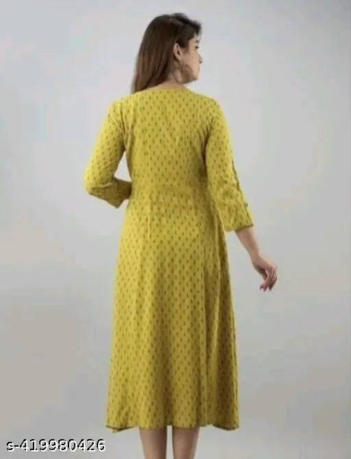 Yellow rayon three-quarter sleeve kurta with printed combo, Indian traditional clothing on display