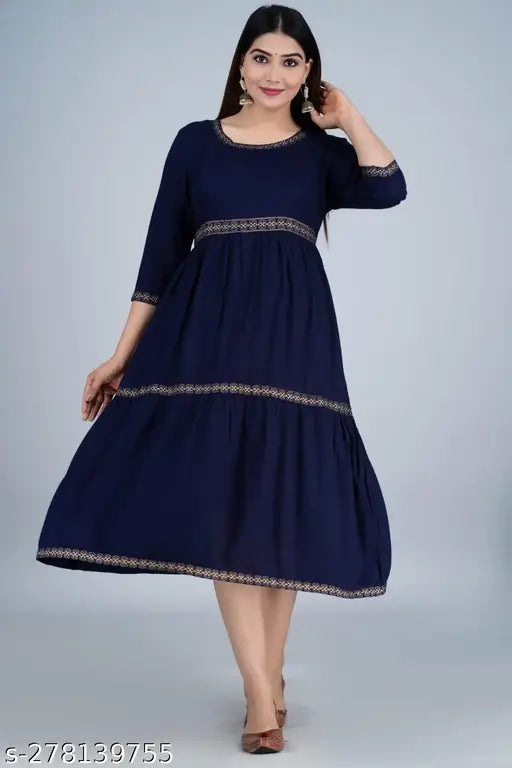 Blue rayon three-quarter sleeve top, solid blue design for women's fashion, close-up view