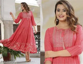 Rayon embroidered tiered kurta dress with three-quarter sleeves, featuring intricate sequin work. Women's size S (36in bust, 48in length) to XXXL (46in bust, 48in length). India origin