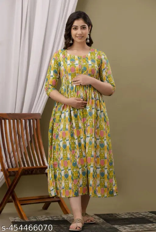 Yellow cotton maternity kurti gown with ikat print, adjustable back robe, discreet feeding access. Indian-made maternity dress for pre and post pregnancy wear." (125 characters)