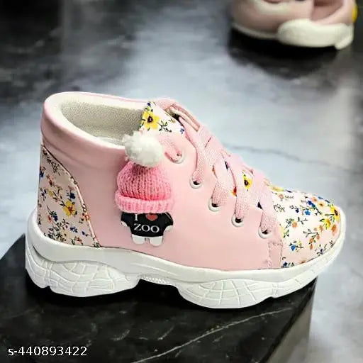 Multicolor synthetic leather and rubber sports shoes for kids, featuring lace-up design, ideal for casual or active wear. Pink color, suitable for both boys and girls aged 2 to 10 years old. Indian origin
