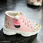 Multicolor synthetic leather and rubber sports shoes for kids, featuring lace-up design, ideal for casual or active wear. Pink color, suitable for both boys and girls aged 2 to 10 years old. Indian origin
