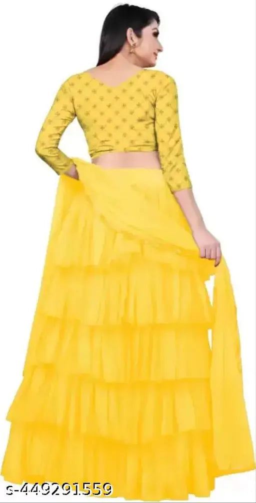 Embroidered net semi-stitched Lehenga & crop top with ruffled dupatta, Indian bridal wear on display stand