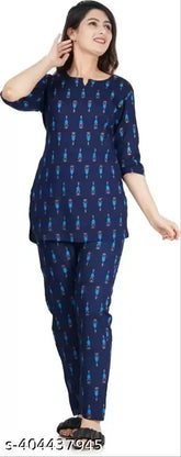 Navy Blue Viscose Rayon Printed Floral Night Suit Set - Comfortable fit for lounging & sleeping, featuring chic bell print design. Breathable, lightweight, and available in sizes S-3XL