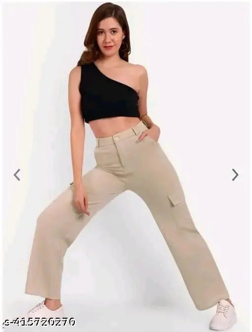 Cream nylon trousers for women, stylish and ravishing with solid pattern. (S: 26", M: 28", L: 30", XL: 32") Indian-made fashion trousers on display
