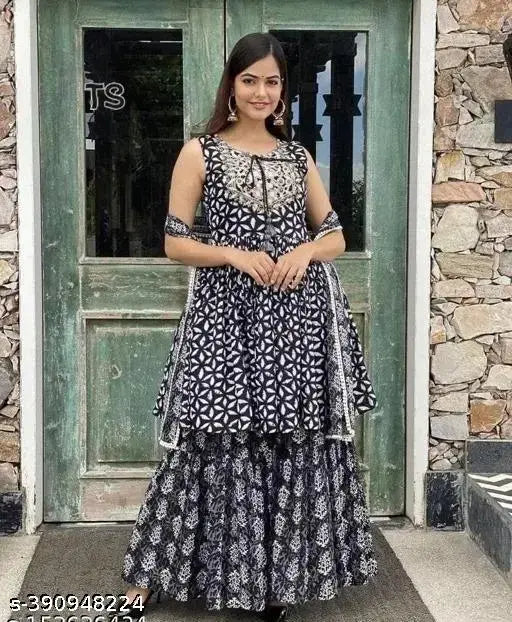 Rayon voguish women's kurta set with sharara & dupatta, printed design, sleeveless, single size XS-XL. Indian ethnic wear on mannequin