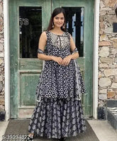 Rayon voguish women's kurta set with sharara & dupatta, printed design, sleeveless, single size XS-XL. Indian ethnic wear on mannequin