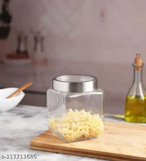 Transparent glass square jars (600ml), ideal for storing kitchen snacks, dry fruits, masala, honey, pickles, and coffee beans. Airtight and perfect for pantry organization, made in India