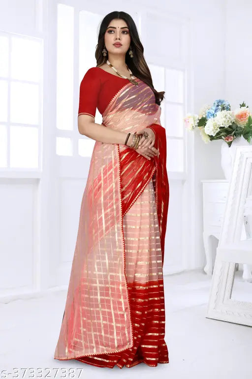 Fancy organza Puspa saree in vibrant colors, perfect for parties and casual outings. Handcrafted with zari woven border and knitting jacquard fabric for comfort and elegance. Includes separate silk blouse piece for customization. Indian-made masterpiece for timeless beauty