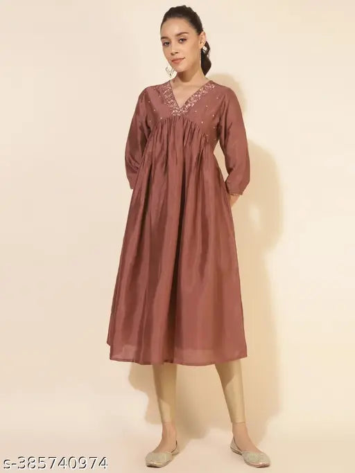 Brown crepe silk embellished empire kurta for women, solid design in three-quarter sleeves. Indian handcrafted attire on mannequin