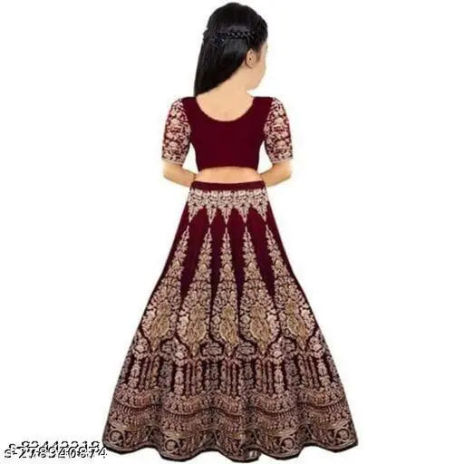 Embroidered velvet and net lehenga-choli for kids, traditional Indian wear with short sleeves. Unstitched for customization, enhances beauty for functions, festivals, parties, or weddings. Country of origin: India