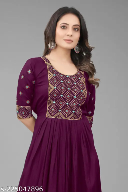 Purple rayon embroidered kurta with three-quarter sleeves, suitable for functions, festivals, parties, and weddings. Indian traditional fashion, comfortable and lightweight