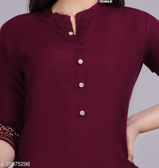 Rayon hand-block gold print stitched kurta with palazzo set, beautiful women's fashion from Mansi's trendy collection, single piece in size L or XL. Indian craftsmanship showcased on display stand
