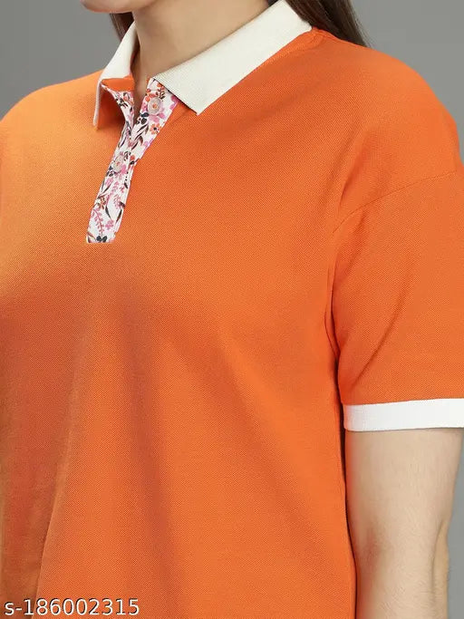 Nimble orange cotton short sleeve smart polo for women, solid color on model wearing