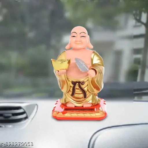 Gold plastic laughing Buddha idol with waving fan and ingot, solar-powered moving head for health, wealth, and prosperity home decor (6.5 cm L x 7.5 cm B x 11 cm H)
