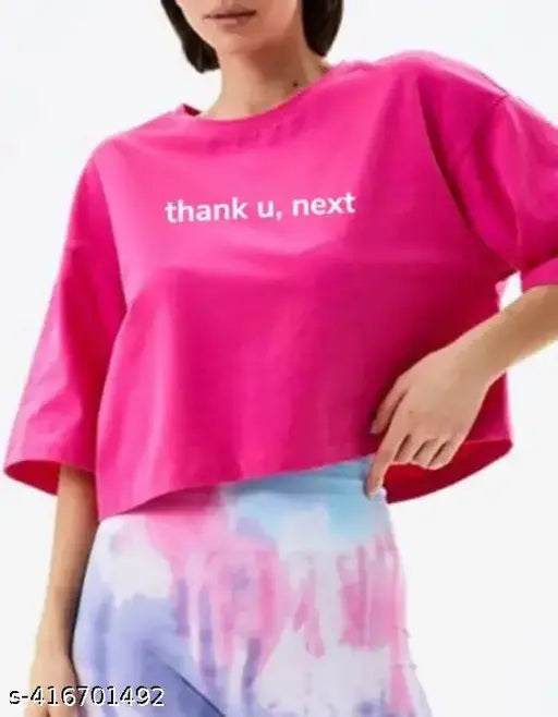 Women's solid round neck polyester cropped oversized relaxed T-shirt, available in trendy colors for versatile fashion