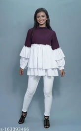 Crepe layered top with colorblocked net pattern, long sleeves, and button closure. Indian-made, attractive design available in sizes XS-XXXL