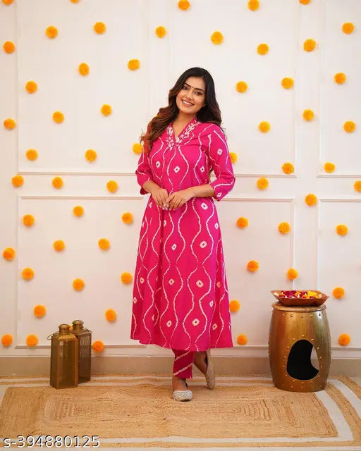 Beautiful pink premium rayon women's kurti and pant co-ord set, floral print and straight silhouette for daily, office, and party wear. Soft cotton fabric, versatile and available in multiple sizes