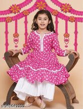 Fancy pink rayon printed anarkali kurta & sharara set with lace work, knee length top and matching bottom for girls 4-5 years