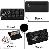 Faux leather/leatherette embellished hand clutch, features 3 zipper pockets & 4 card slots. Free size (8 in x 4 in), made in India