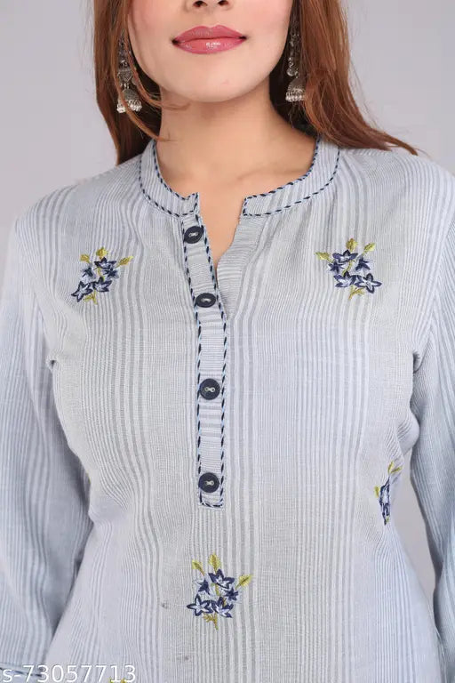 Stylish rayon kurta with cotton palazzos, three-quarter sleeves, printed net design. Indian handloom clothing set on mannequin
