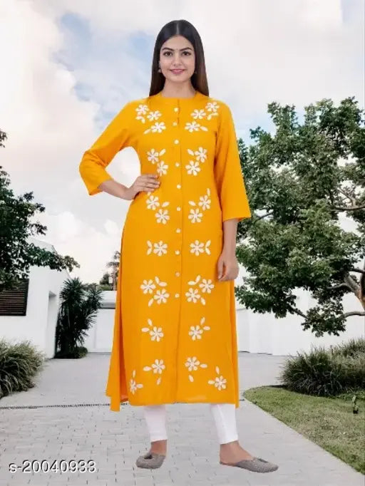Mustard rayon A-line embroidered kurti with three-quarter sleeves, traditional Indian fashion for women
