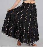 Printed rayon black long skirt, beautiful and comfortable for women. Sizes available: M, L, XL, XXL, XXXL & free size. Made in India