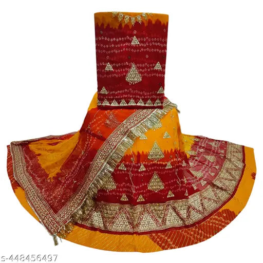 Embroidered Georgette Rajputi poshak set with lehenga, kurti, odni, and satin astar. Indian-made party wear with zari work." (124 characters)