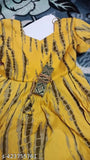 Yellow Georgette printed long kurti dress with round neck and three-quarter sleeves, trending Bollywood party wear gown for girls and women